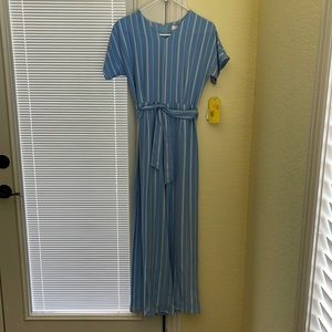 Kids romper with zipper in the back and belt. Never worn